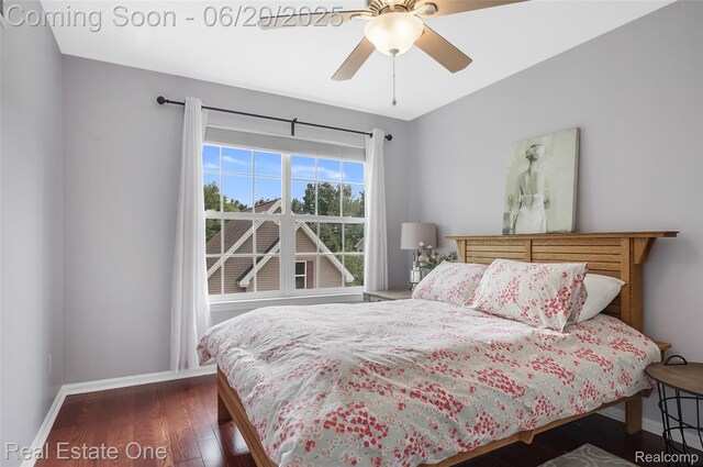 9806 Goldfinch Ct, Saline, MI 48176 - bedroom with wood finished floors and ceiling fan