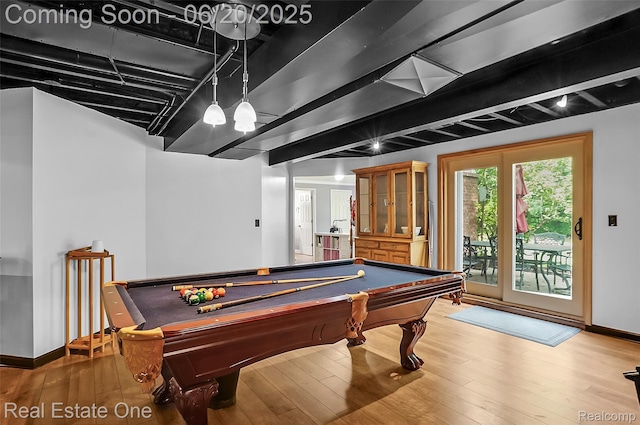 9806 Goldfinch Ct, Saline, MI 48176 - rec room with billiards and wood finished floors