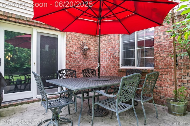 9806 Goldfinch Ct, Saline, MI 48176 - view of patio / terrace with outdoor dining area