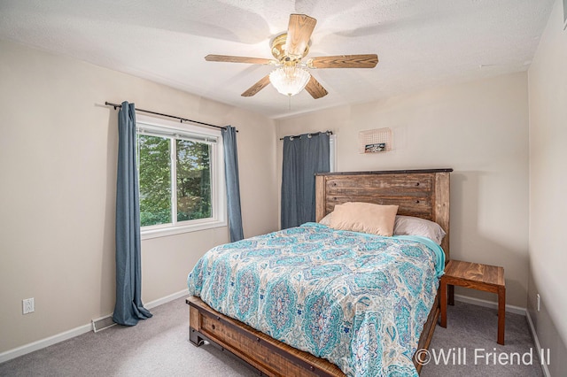 10296 S Lakeside Ridge Rd, Baldwin, MI 49304 - carpeted bedroom featuring baseboards and a ceiling fan