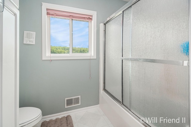 10296 S Lakeside Ridge Rd, Baldwin, MI 49304 - bathroom with baseboards and enclosed tub / shower combo