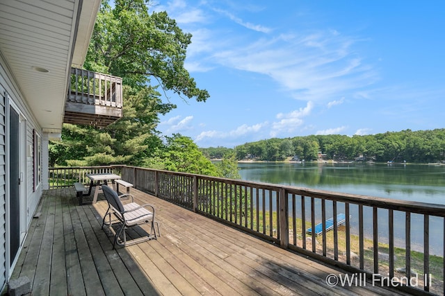 10296 S Lakeside Ridge Rd, Baldwin, MI 49304 - deck with a water view and a forest view