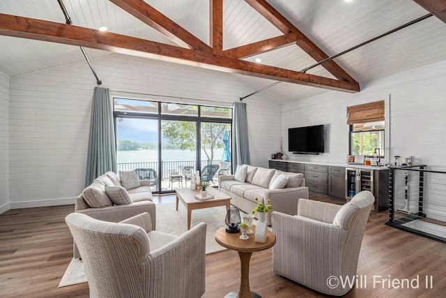 10296 S Lakeside Ridge Rd, Baldwin, MI 49304 - living room featuring wood finished floors, wooden walls, and wine cooler