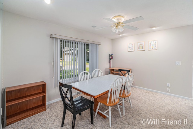 10296 S Lakeside Ridge Rd, Baldwin, MI 49304 - dining room featuring light carpet and ceiling fan