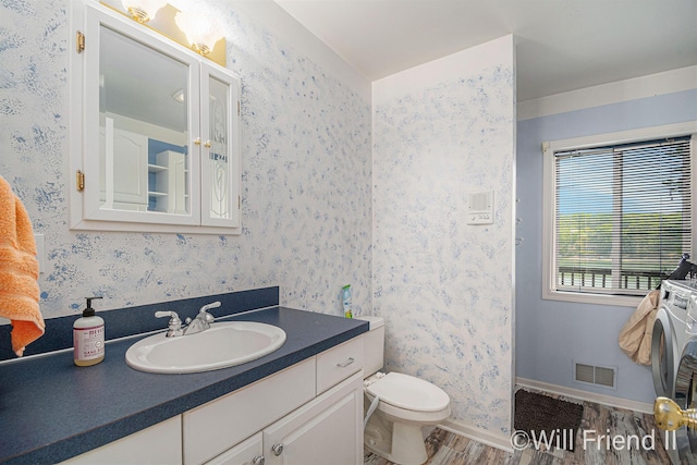 10296 S Lakeside Ridge Rd, Baldwin, MI 49304 - bathroom with vanity and wood finished floors