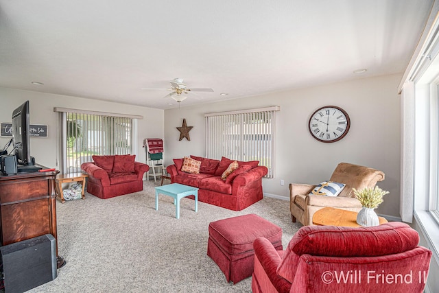 10296 S Lakeside Ridge Rd, Baldwin, MI 49304 - carpeted living area with healthy amount of natural light and a ceiling fan