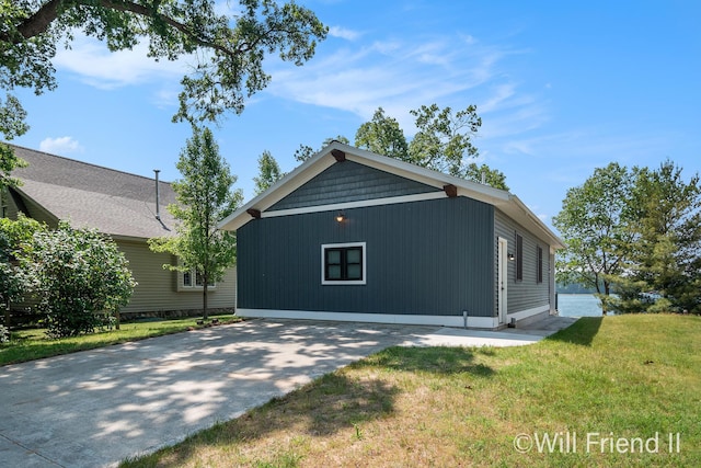 10296 S Lakeside Ridge Rd, Baldwin, MI 49304 - view of side of property featuring a yard