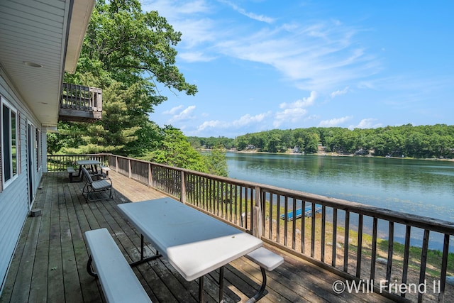 10296 S Lakeside Ridge Rd, Baldwin, MI 49304 - wooden deck with a water view and a wooded view
