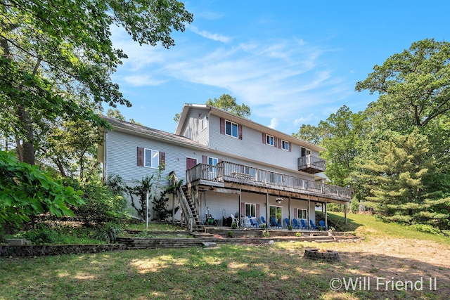 10296 S Lakeside Ridge Rd, Baldwin, MI 49304 - rear view of house with a deck, a lawn, stairs, and a patio area