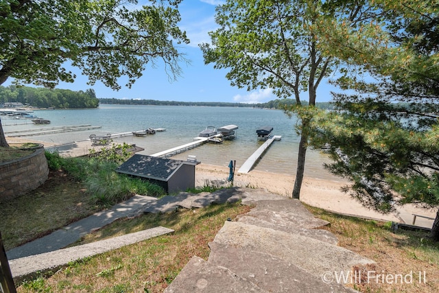 10296 S Lakeside Ridge Rd, Baldwin, MI 49304 - water view with a dock