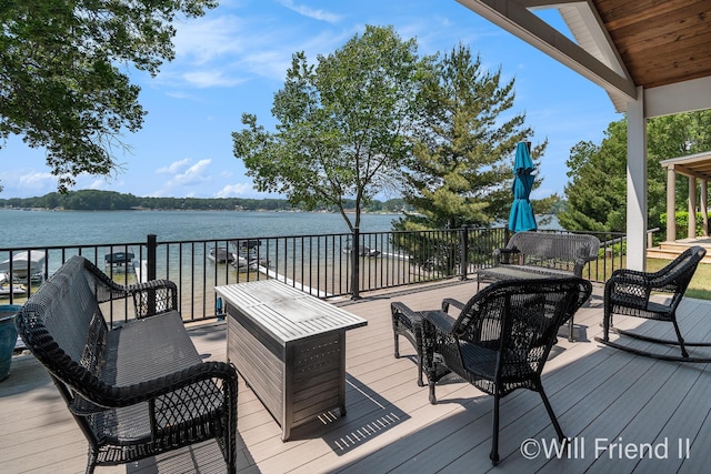 10296 S Lakeside Ridge Rd, Baldwin, MI 49304 - wooden deck with a water view