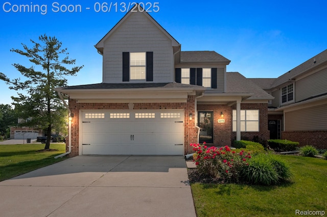 4376 Bennett Park Cir, Troy, MI 48085 - view of front of home with brick siding, concrete driveway, a front yard, and a garage