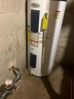 2928 Austin St, Muskegon, MI 49444 - utility room featuring water heater