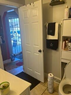 2928 Austin St, Muskegon, MI 49444 - washroom with light tile patterned flooring and arched walkways