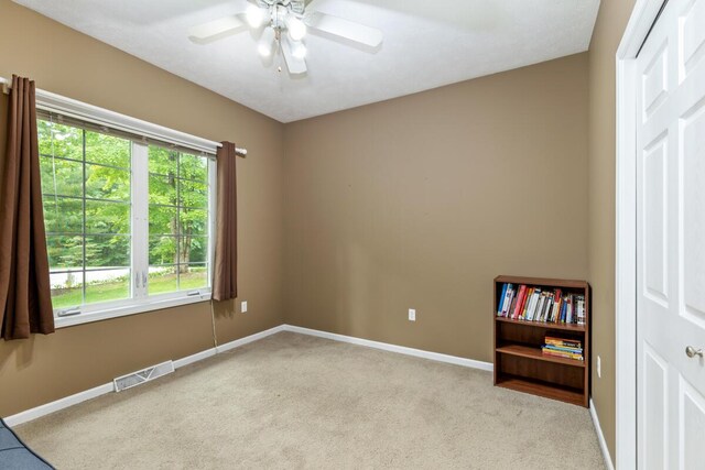 1995 Shining Tree Dr NE, Belmont, MI 49306 - carpeted empty room featuring baseboards and ceiling fan
