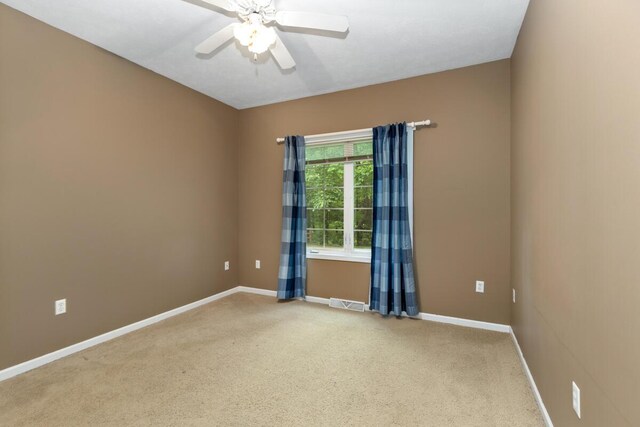 1995 Shining Tree Dr NE, Belmont, MI 49306 - carpeted empty room with baseboards and ceiling fan