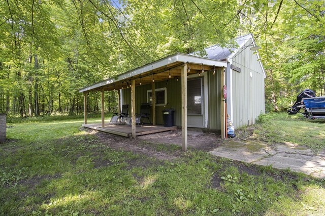 8114 E 72nd St # 2, Newaygo, MI 49337 - view of outbuilding featuring a view of trees