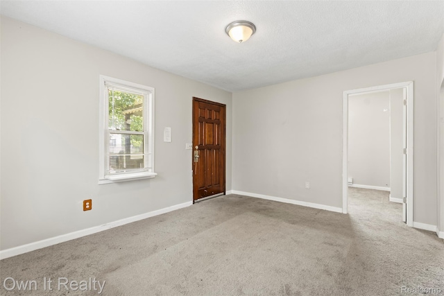 12408 Sarsfield Ave, Clinton Township, MI 48089 - carpeted foyer entrance featuring baseboards