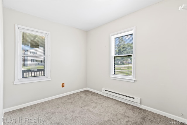 12408 Sarsfield Ave, Clinton Township, MI 48089 - carpeted empty room featuring a baseboard heating unit and baseboards