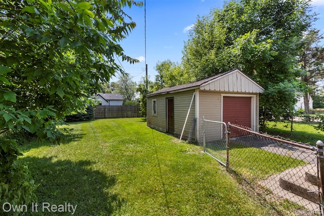 12408 Sarsfield Ave, Clinton Township, MI 48089 - fenced backyard featuring a detached garage and an outbuilding