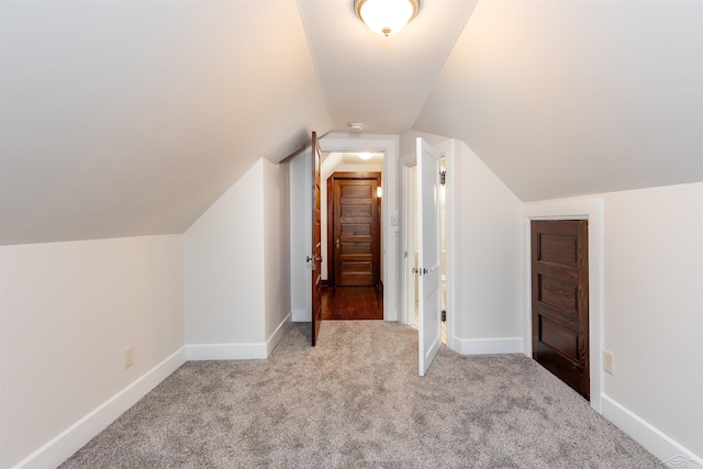 820 N Johnson St, Bay City, MI 48708 - bonus room featuring carpet floors and lofted ceiling