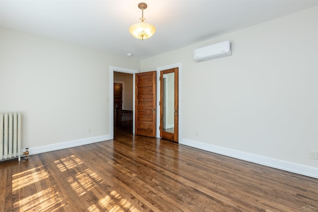 820 N Johnson St, Bay City, MI 48708 - empty room featuring a wall unit AC, radiator heating unit, and dark wood-style floors