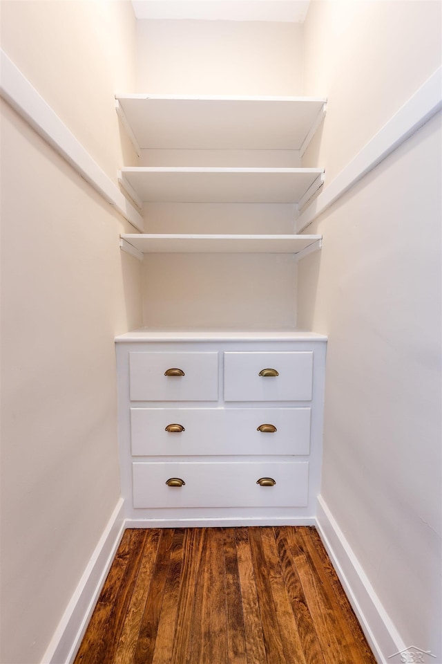 820 N Johnson St, Bay City, MI 48708 - walk in closet featuring dark wood finished floors