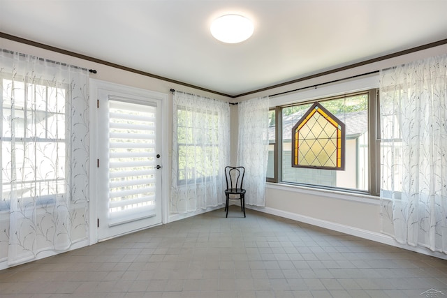 820 N Johnson St, Bay City, MI 48708 - unfurnished sunroom with baseboards and ornamental molding