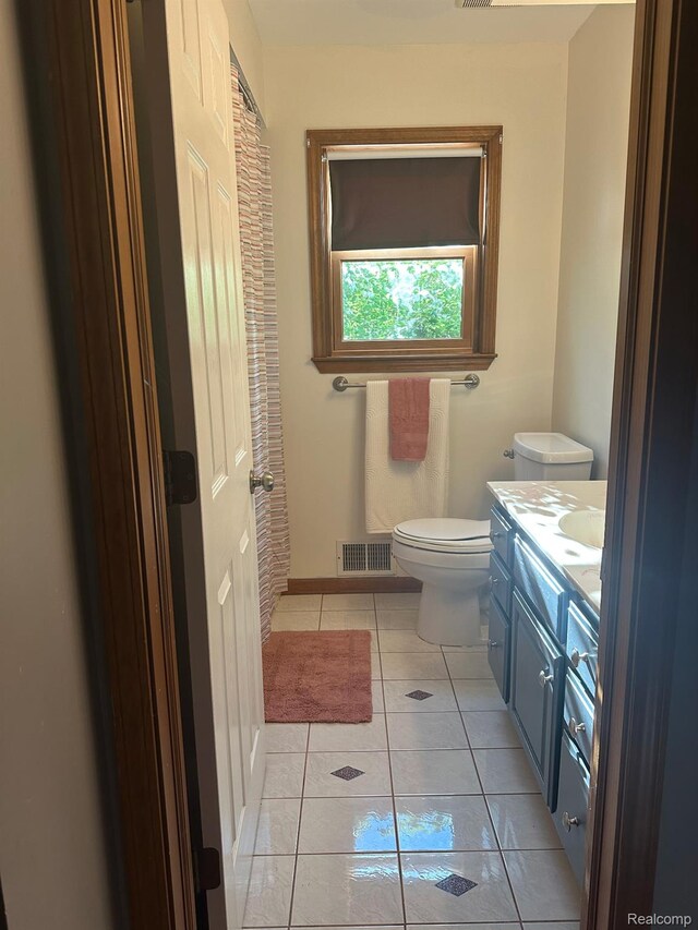 2520 Chilson Meadows Ln, Howell, MI 48843 - half bathroom with tile patterned floors and vanity