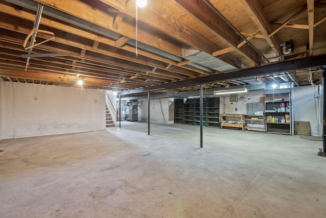 2850 Sherbourne Dr, Troy, MI 48083 - unfinished below grade area with stairs and heating unit