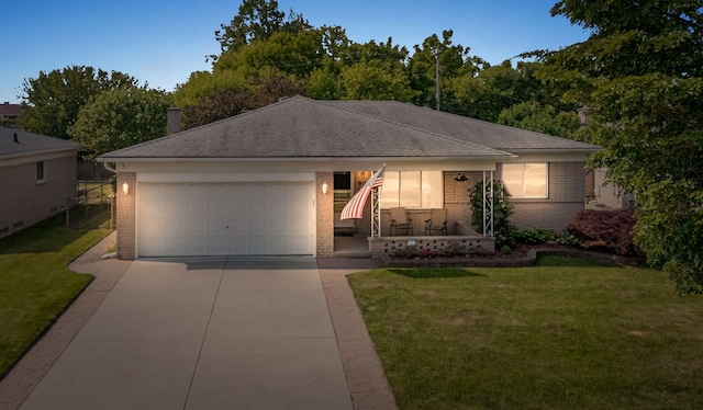 2850 Sherbourne Dr, Troy, MI 48083 - ranch-style home featuring brick siding, a porch, driveway, a garage, and a front lawn
