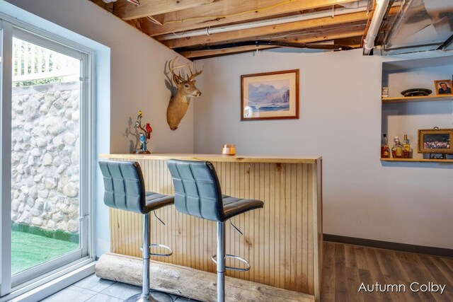 5980 Division St, Newaygo, MI 49337 - indoor dry bar featuring wood finished floors and healthy amount of natural light