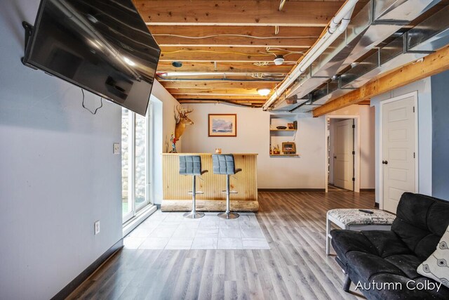5980 Division St, Newaygo, MI 49337 - basement with wood finished floors and a dry bar
