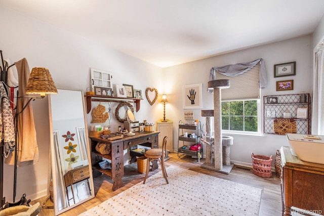 4022 Stonebridge, Holly, MI 48442 - office area with light wood-style flooring and baseboards
