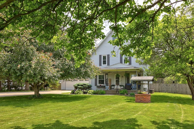 1105 W Genesee St, Frankenmuth, MI 48734 - view of front of property featuring a porch and a garage