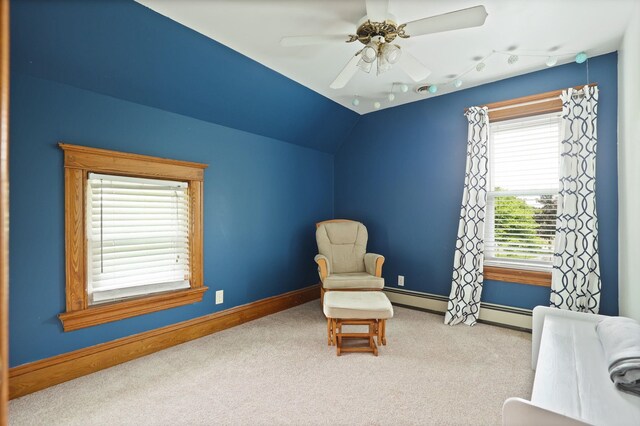 1105 W Genesee St, Frankenmuth, MI 48734 - sitting room with carpet flooring, rail lighting, a ceiling fan, and baseboard heating