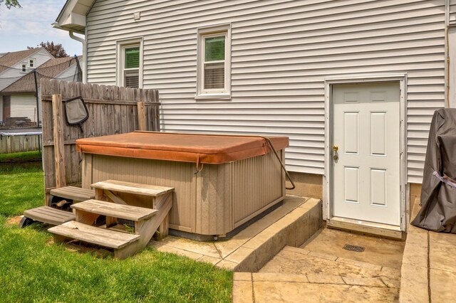 1105 W Genesee St, Frankenmuth, MI 48734 - wooden deck with a hot tub