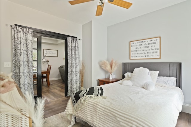 1105 W Genesee St, Frankenmuth, MI 48734 - bedroom with wood finished floors and a ceiling fan