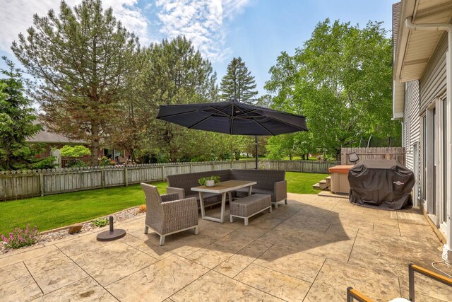 1105 W Genesee St, Frankenmuth, MI 48734 - fenced backyard with outdoor dining area, a patio, and area for grilling