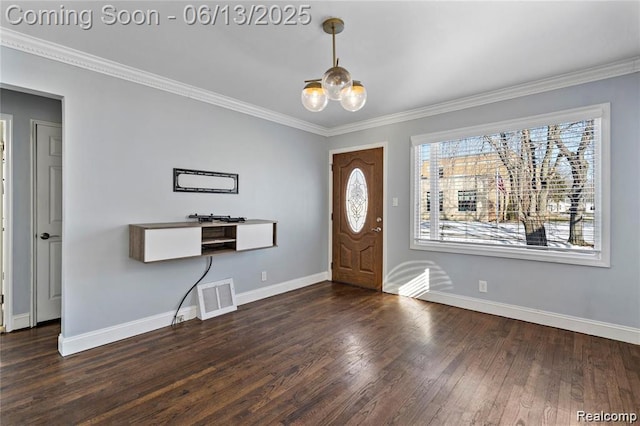 4033 Oakshire Ave, Berkley, MI 48072 - entryway featuring a chandelier, wood finished floors, crown molding, and healthy amount of natural light
