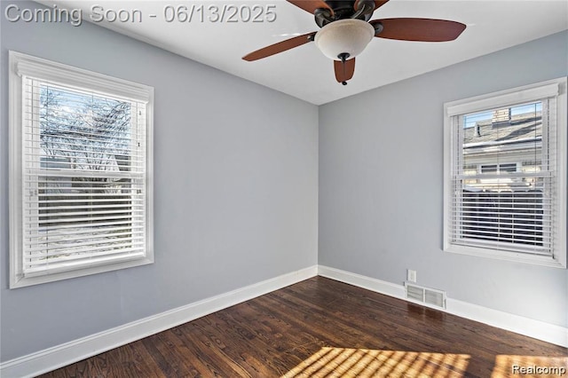 4033 Oakshire Ave, Berkley, MI 48072 - spare room with dark wood-type flooring and a ceiling fan