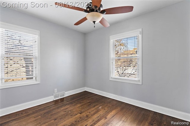 4033 Oakshire Ave, Berkley, MI 48072 - empty room featuring healthy amount of natural light, dark wood-style flooring, and ceiling fan