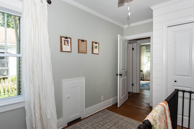 1303 Homecrest Ave, Kalamazoo, MI 49001 - bedroom featuring multiple windows, wood finished floors, and crown molding