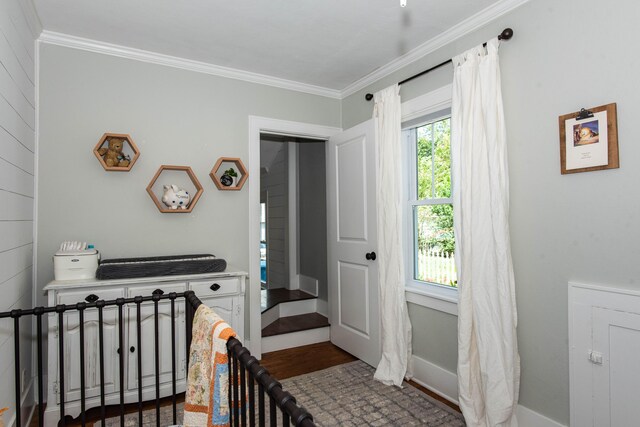 1303 Homecrest Ave, Kalamazoo, MI 49001 - bedroom featuring crown molding and wood finished floors