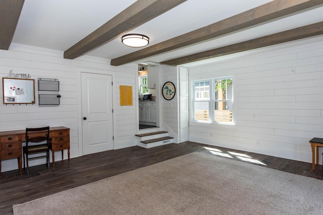 1303 Homecrest Ave, Kalamazoo, MI 49001 - living area featuring dark wood finished floors, wooden walls, and beamed ceiling