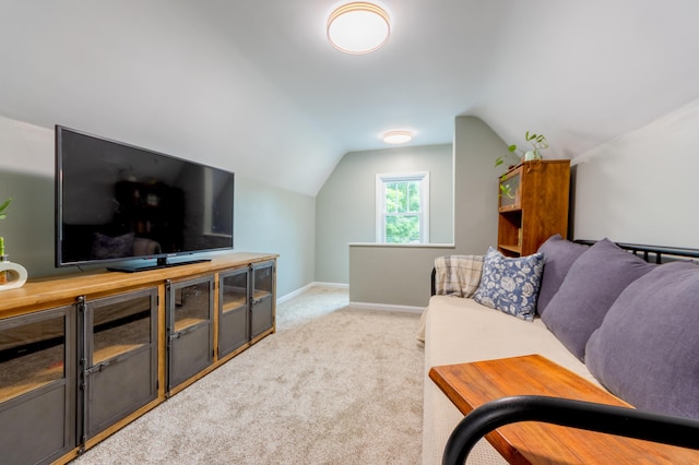 1303 Homecrest Ave, Kalamazoo, MI 49001 - living room featuring vaulted ceiling and light carpet