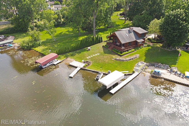 2757 S Hacker Rd, Brighton, MI 48114 - view of subject property featuring a nearby body of water and a tree filled landscape