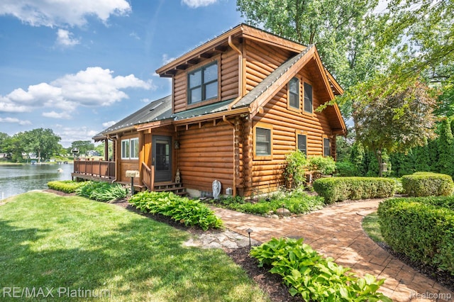 2757 S Hacker Rd, Brighton, MI 48114 - rear view of property featuring a water view, a lawn, and log siding