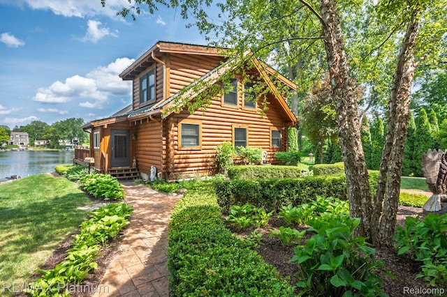 2757 S Hacker Rd, Brighton, MI 48114 - view of property exterior featuring a water view, log exterior, and a yard