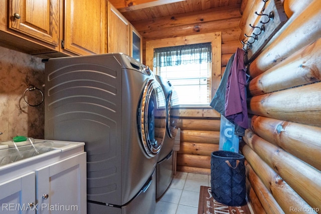 2757 S Hacker Rd, Brighton, MI 48114 - laundry room with log walls, cabinet space, light tile patterned flooring, washer and dryer, and wood ceiling